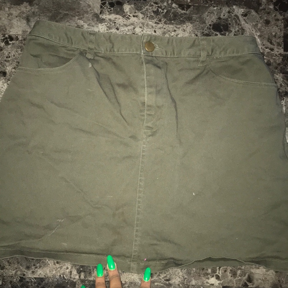 green mini skirt